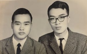 James with his half-brother, Toh Seng.