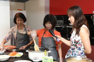 Dr Amy Khor, Senior Minister of State for Health , demonstrating how to make Chicken and Vegetable Stew -a high protein dish.