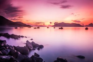 A beautiful sunrise paints the morning sky at Con Dao Island, Ba Ria Vung Tau Province, Vietnam. © Cao Tran Tho / Shutterstock