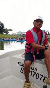 Francis taking a small breather from dragon boating.